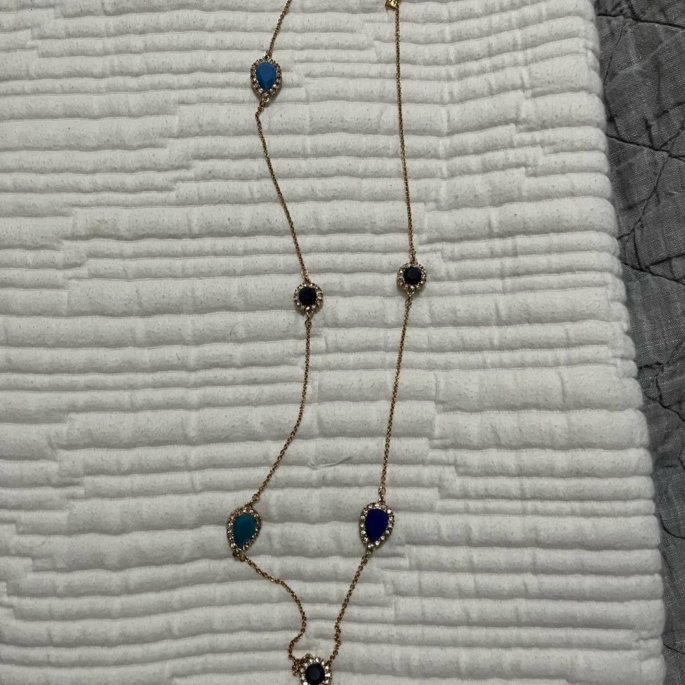 Elegant Gold Necklace with Blue and Black Accents